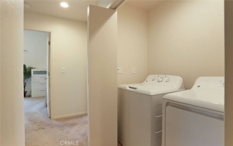 Inside laundry closet with room for shelving or cabinets. Washer and dryer are included!