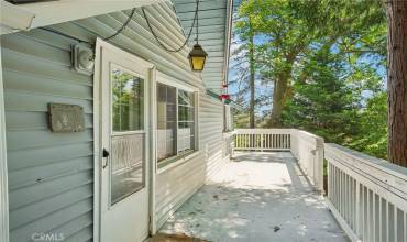 Front entry and wraparound deck