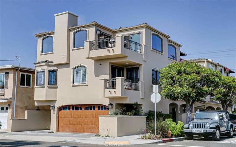 Exceptional corner location this freestanding townhome is just two blocks to the sand.
