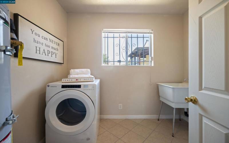 Laundry Room with Shelves and Sink