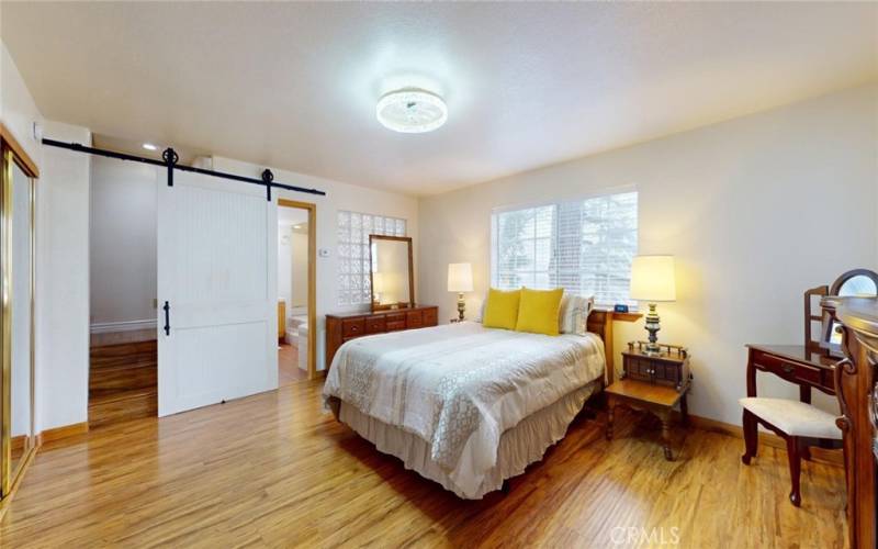 Master Bedroom with Barn door to Master Bath