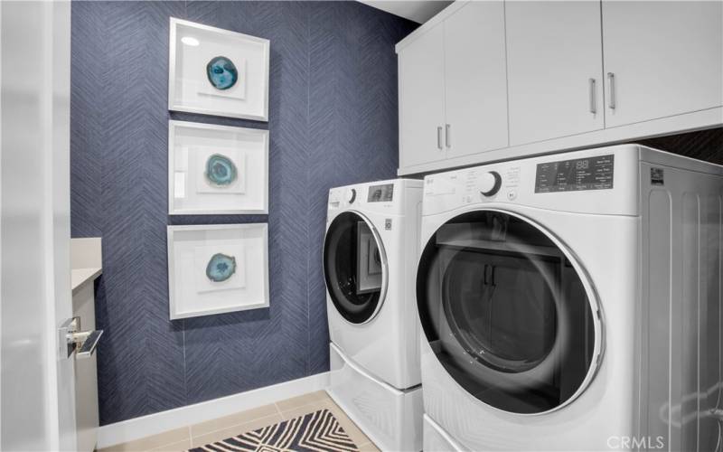 Separate laundry room.