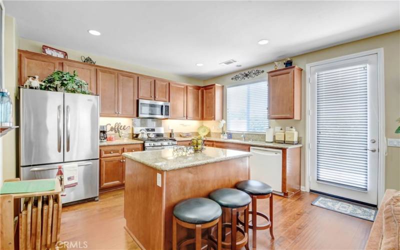 Kitchen with Island granite counter tops
