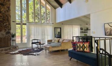 Living space with gorgeous cathedral ceilings