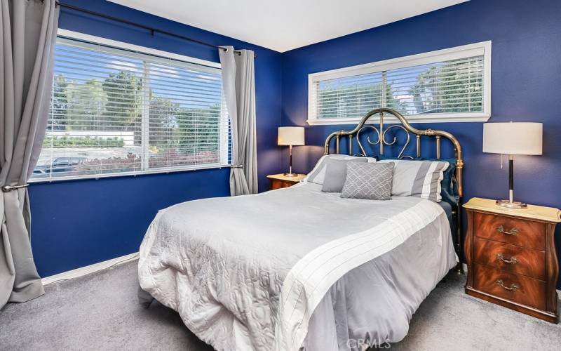 Three additional bright and airy downstairs bedrooms with sparkling windows, ample closet space to maximize storage and plush carpet. Perfect floor plan for guests and/or maid’s quarters.