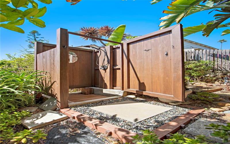 Full size hot and cold running outdoor shower. 