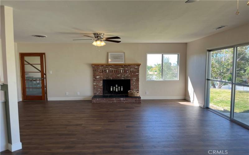 Fireplace in family room.  Door on the left leads to the center room, laundry room, and master.
