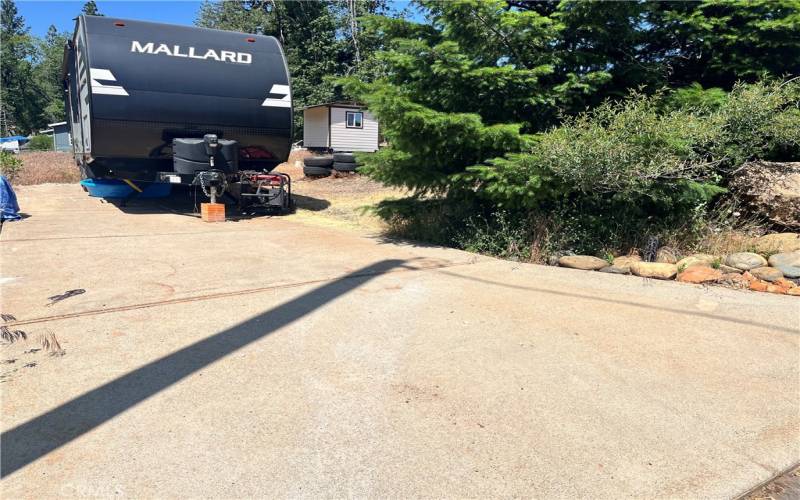 2nd driveway. Trailer not included with sale.