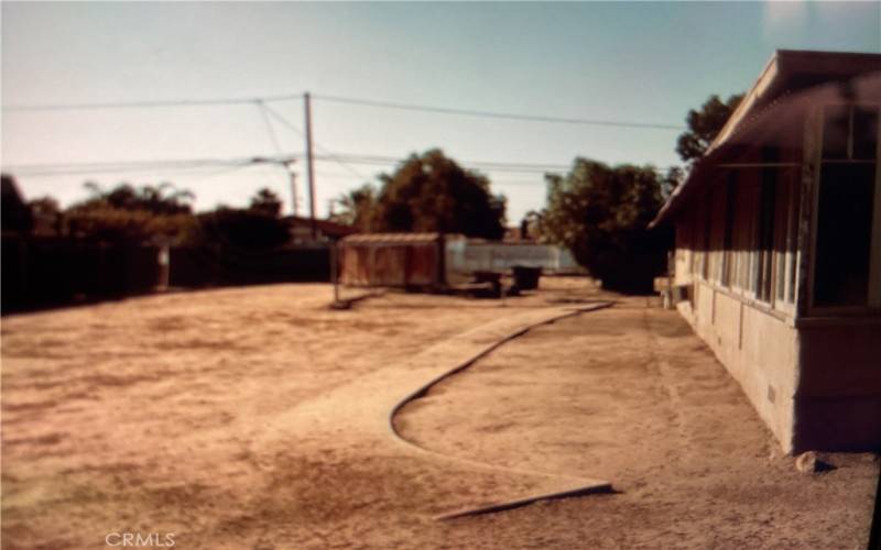 Left Side of House with patially Fenced Yard