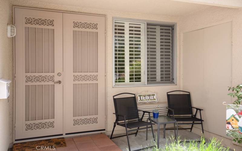Front porch with custom screen door