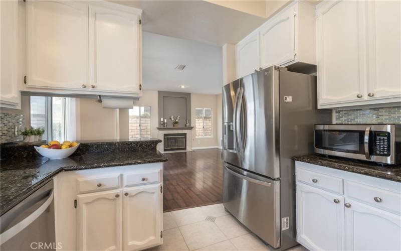 Stainless steel appliances in the kitchen will stay.