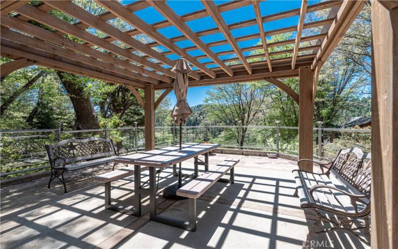 Covered Flag Stone Patio with Custom  Glass Fencing