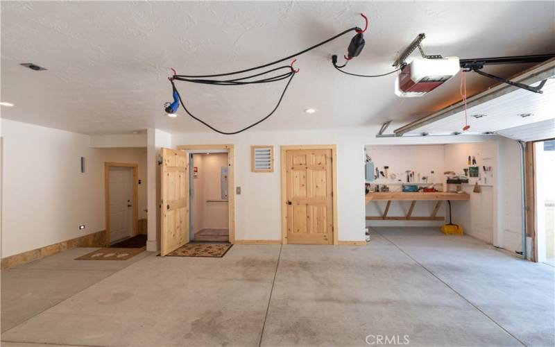 Garage Elevator & Work Bench Area