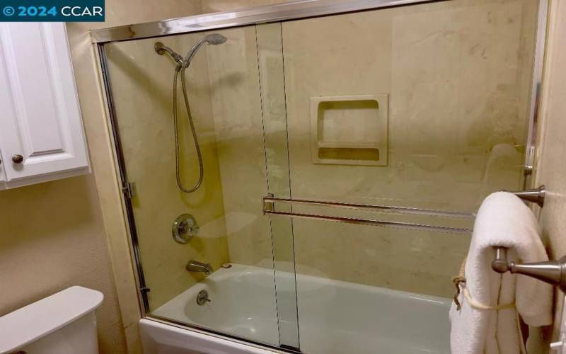 TUB SHOWER W/SOLID SURFACE