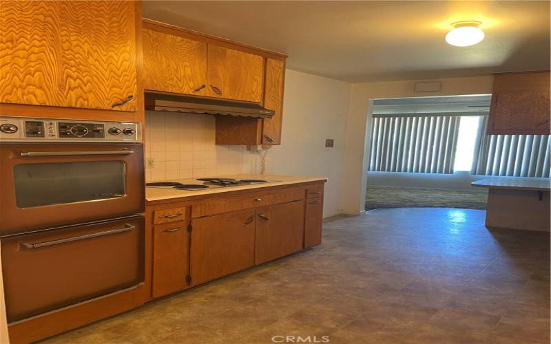 kitchen has double oven built in stove