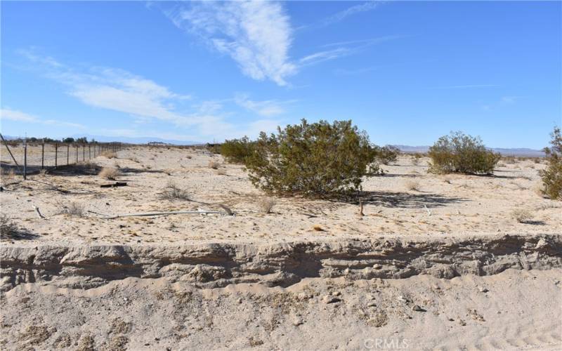 fencing along southern border of lot