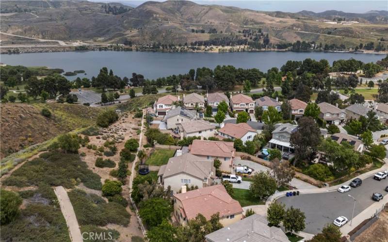 Aerial view of house and lake