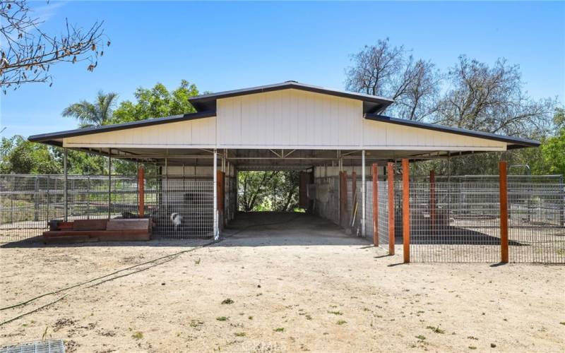Four stall breezeway Mare Motel is being used for goats, pigs & chickens. Easy to convert back to horses if needed.