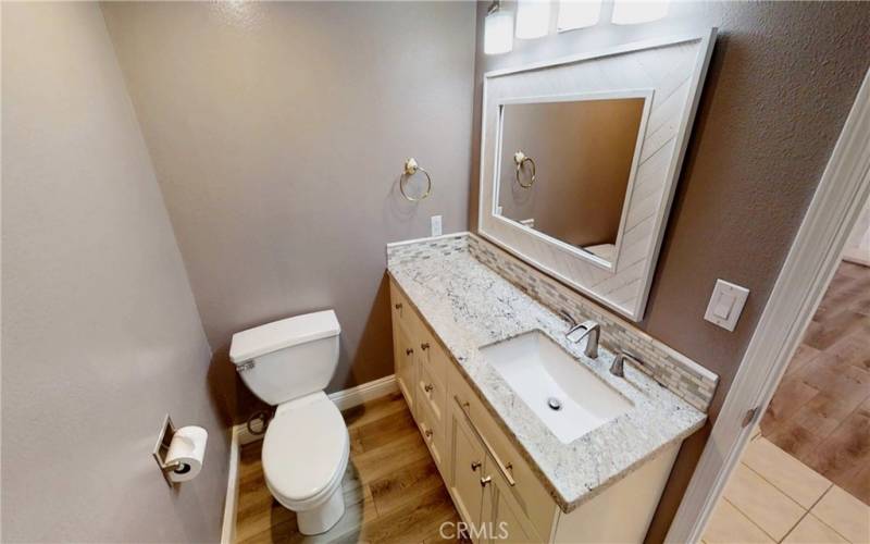 lower bathroom recently remodeled with custom cabinets and granite counter tops
