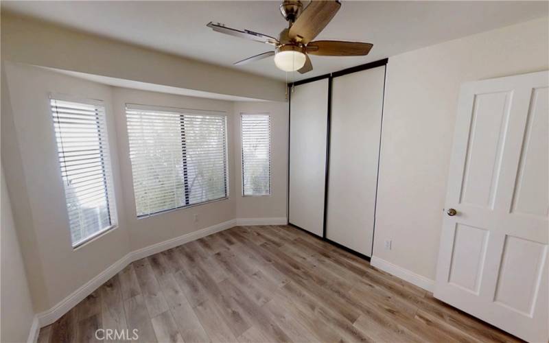 upstair bedroom with closet organizer