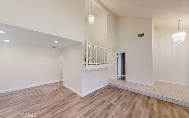 view from living room toward entry and formal dining area