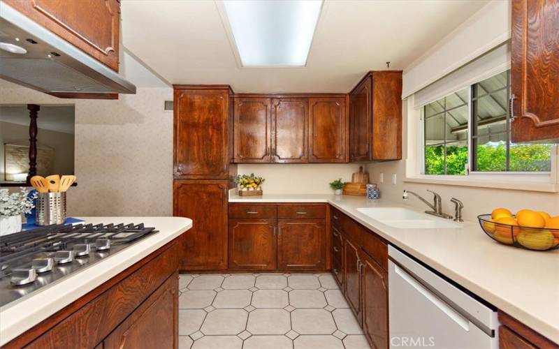 Kitchen offers spacious cabinets.