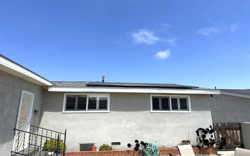 Rear of house showing leased solar panels