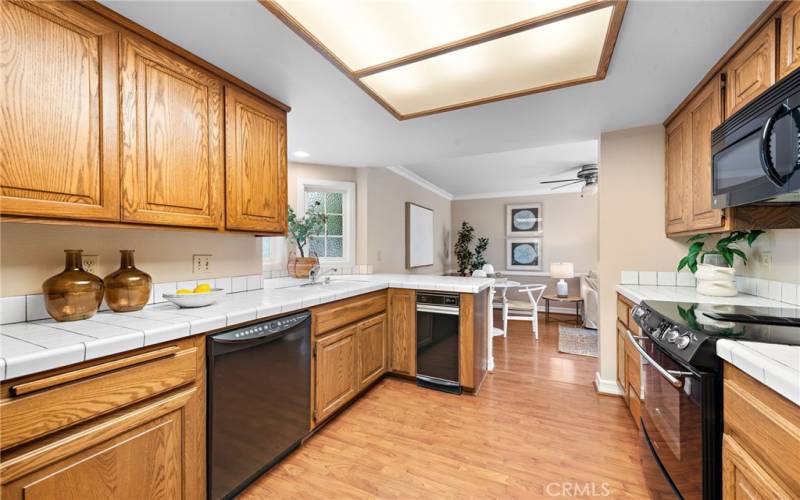 Galley style Kitchen opens to the Family room