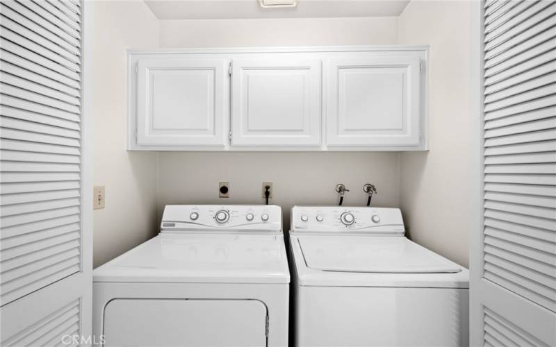 Washer/ Dryer upstairs in a closet