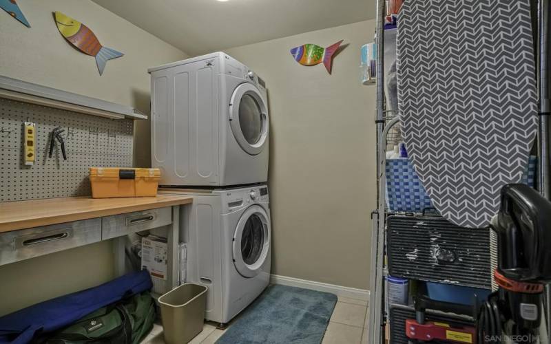 Plenty of room in this spacious laundry with full sized stackable washer and dryer