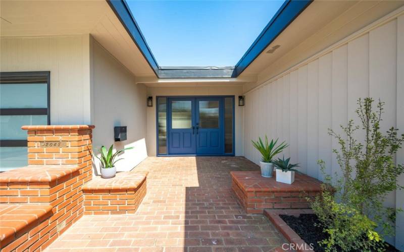 Gorgeous entry- metal frame garage door