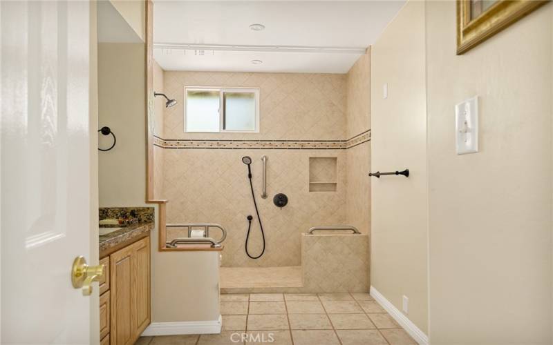 Main level bathroom with handicap accessibility.