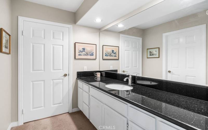 Third Bedrooms portion of jack and jill bath with granite counters and large walk in closet!