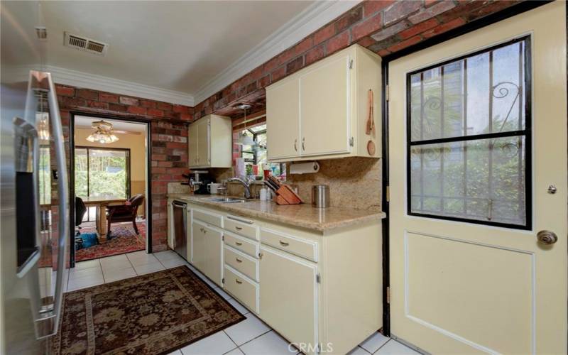 Kitchen door to the side yard.