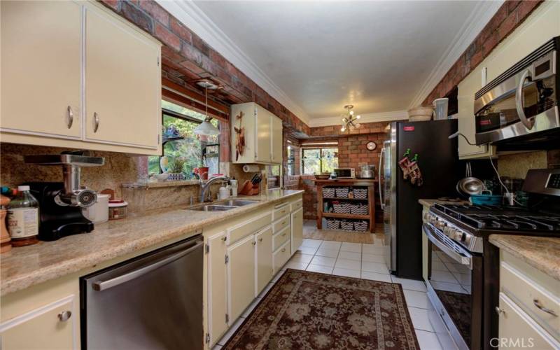 Kitchen with dishwasher and stove.