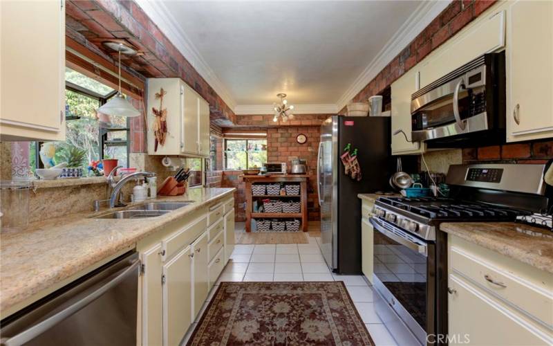 Kitchen with granite counters.