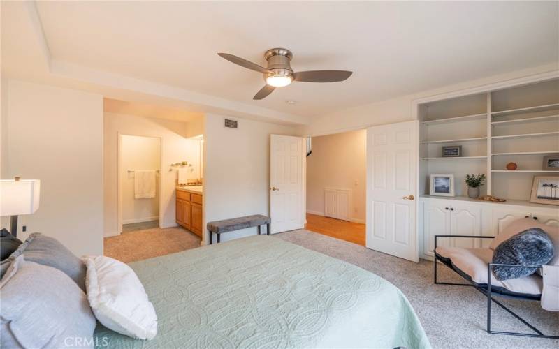 Downstairs primary bedroom with ensuite is perfect for kids or multi-generational living.