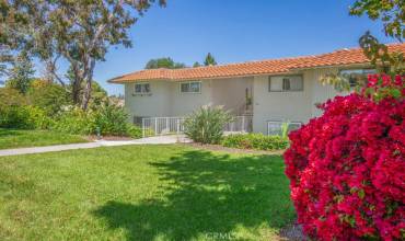 Welcome to 890-N Ronda Sevilla - a lovely two-bedroom, two-bathroom upper-end unit CASTILLA residence in the Laguna Woods senior community. This residence has gorgeous lush landscaping maintained by the Mutual.