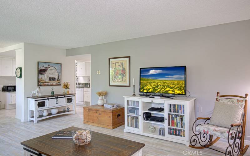 Another view of the living room. Entry to kitchen can be seen in left background.