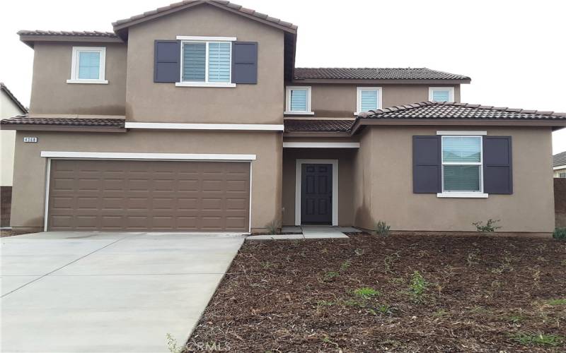 Front Entrance to the two story homes with Custom Wood Shutter throughout living area approx. 2,744 sq ft and good rear yard over 7000 sq ft.