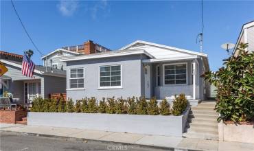 North Hermosa Beach coastal bungalow. Just a few blocks to the beach and perched above Longfellow Avenue with stylish and tasteful finishes and featuring 3 bedrooms, 2 baths, 1,311 sq.ft. of living space, on a 2,439 sq.ft. lot.