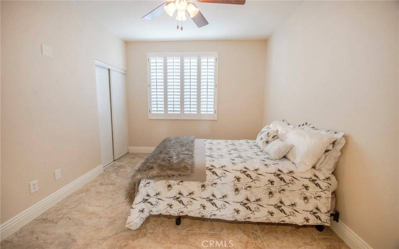 Downstairs bedroom complete with adjacent bathroom.