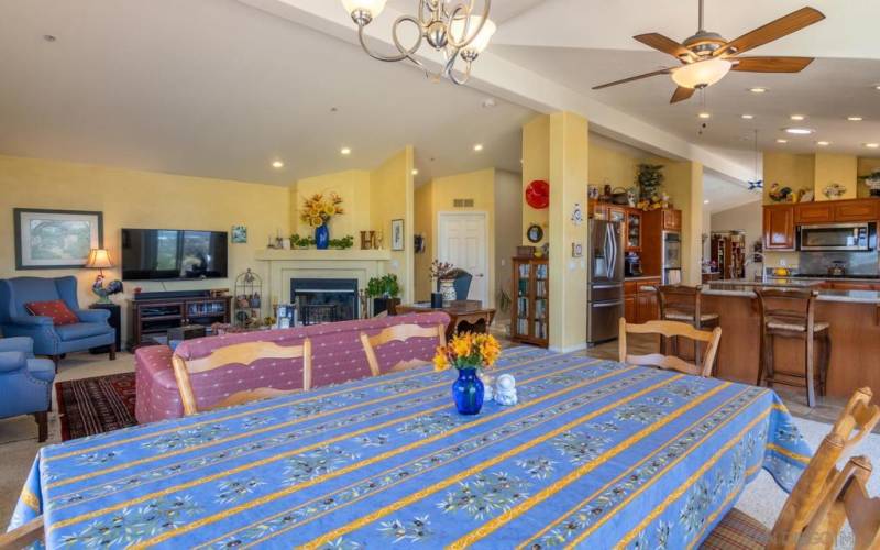 Dining area is right next to the kitchen breakfast bar and family room.