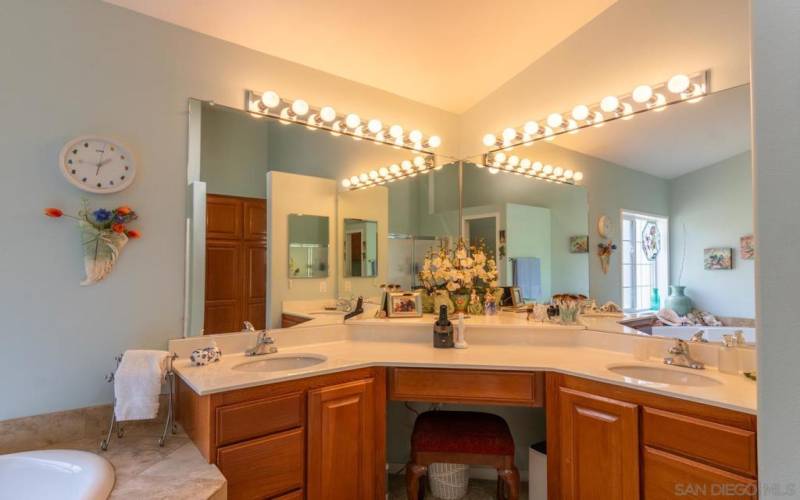 Lots of light and plenty of room to share the double sinks.  Nice vanity area and enough cabinet space for storage.