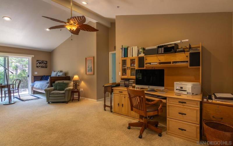 Perfect fit for an office, surrounded by built-in bookshelves.