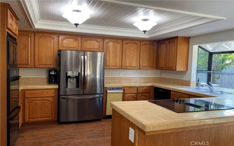 Eat in family kitchen with breakfast bar and room for a large dining table.