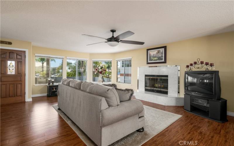 Living Room w White Stone Fireplace