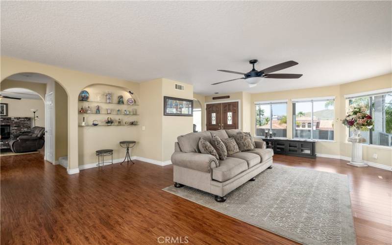 Living Room goes into Den & Kitchen