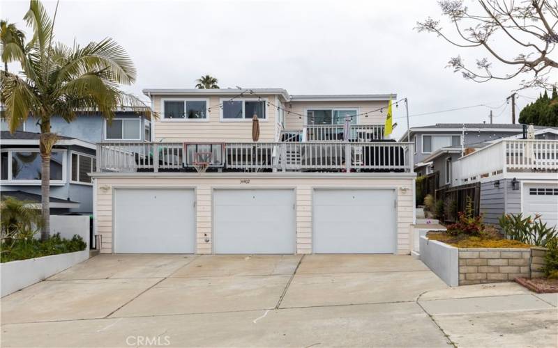 3 garages and plenty of off street parking.