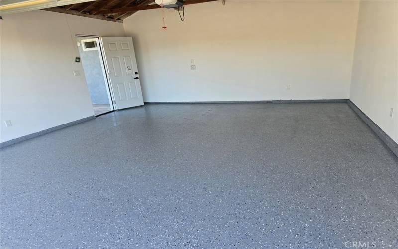 Nice Garage With Insulated Wall And Epoxy Flooring  Paint .